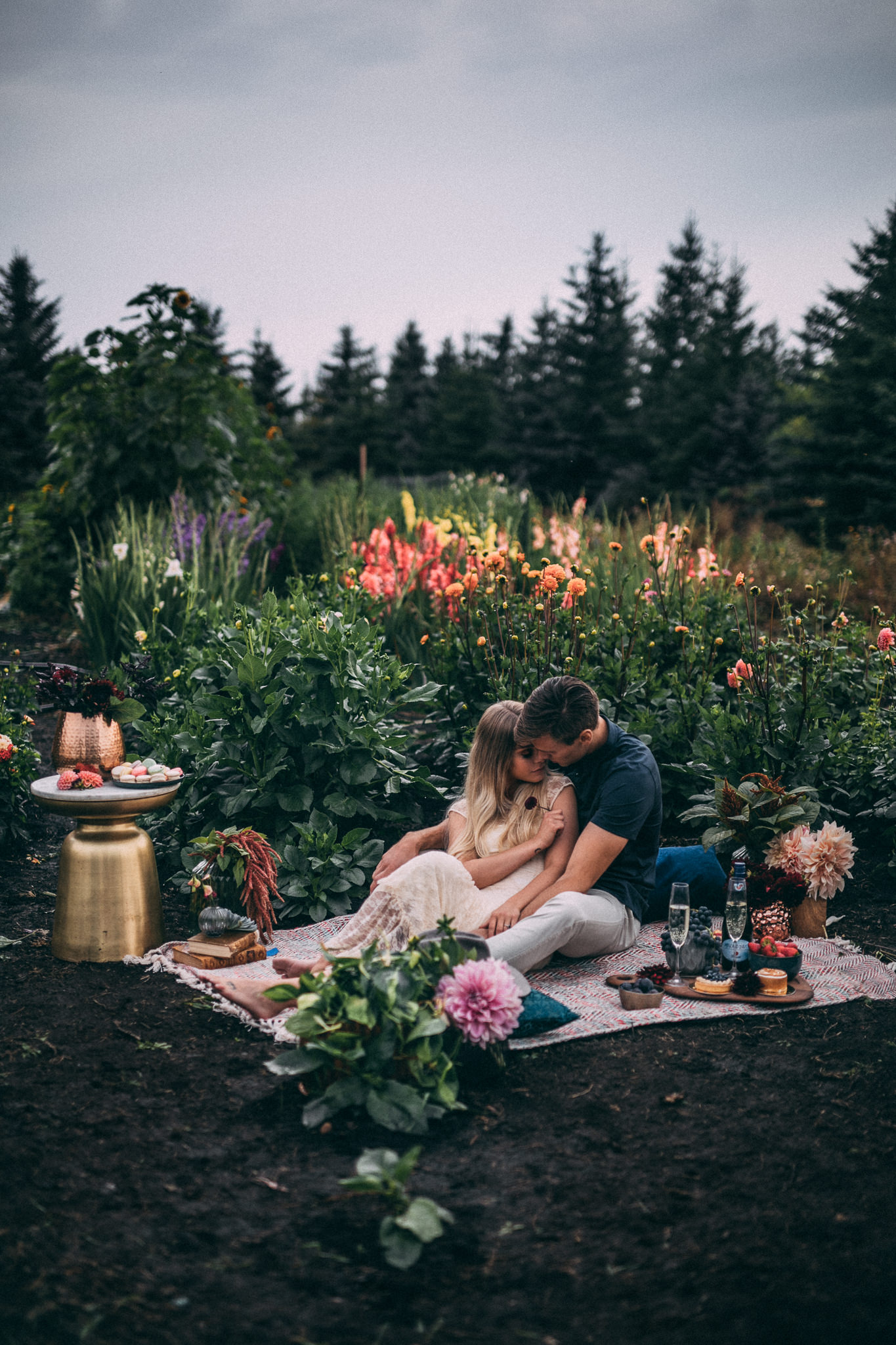 Flower field picnic engagement