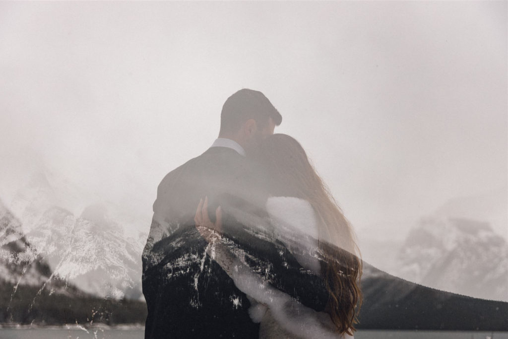 snowy intimate wedding at silvertip resort banff alberta wedding photographer